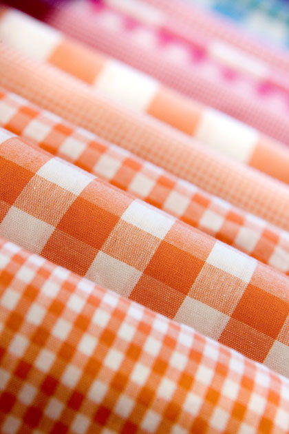 Oranje ruitjesstof
